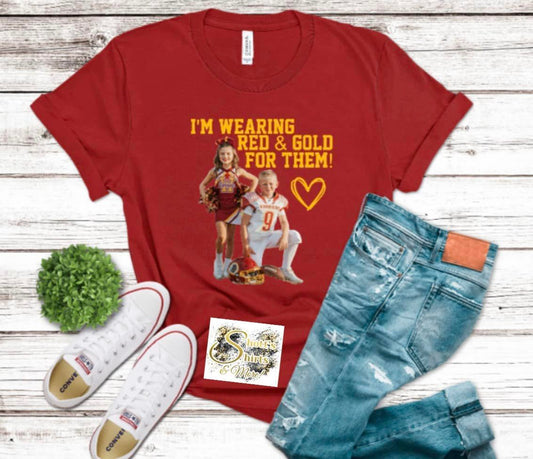 She cheers He Tackles